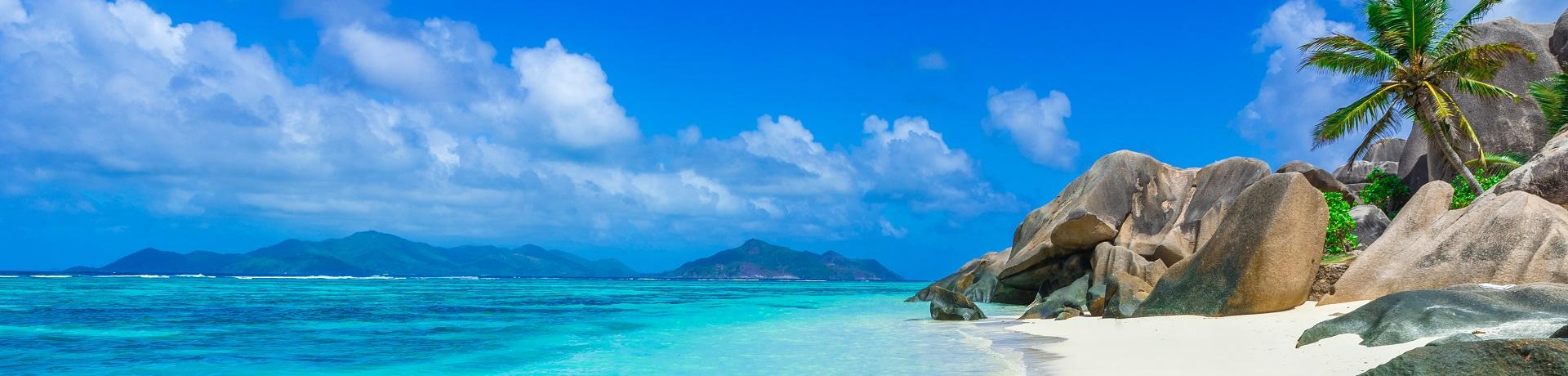 Strand, Meer, Palmen Insel La Digue