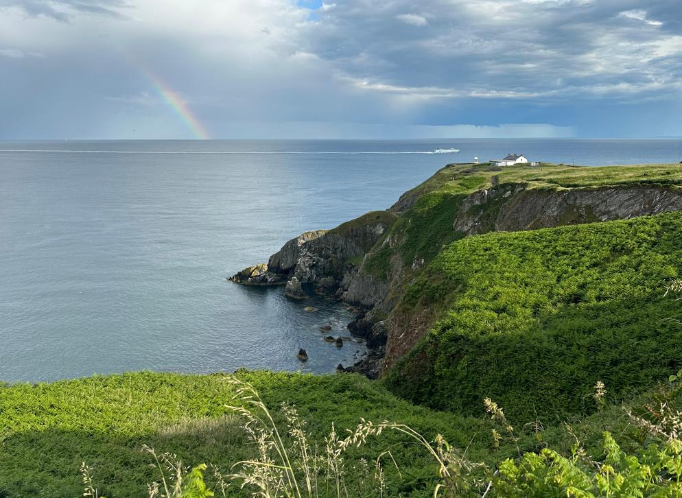 Leuchtturm und Regenbogen